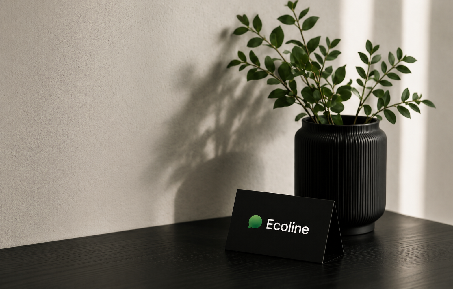 Ecoline contact card and a plant